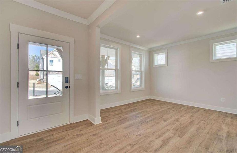 Spacious, unfurnished interior of a new home in The Paddocks at Doc Hughes, Buford (Image 33).
