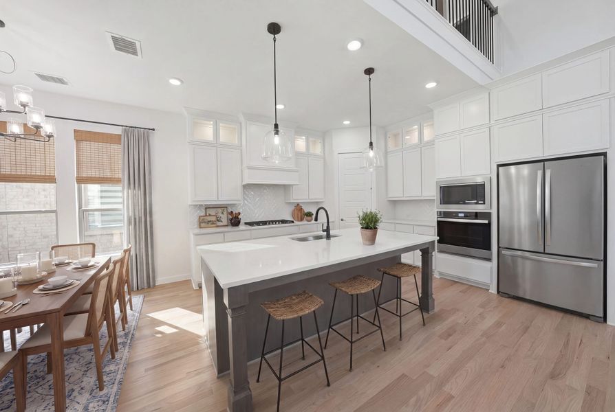 Furnished interior view inside a new home in Light Farms Brenham - 40' Lots, Celina (Image 17).