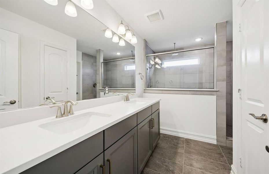Double vanity in owner's suite Double vanity in owner's suite