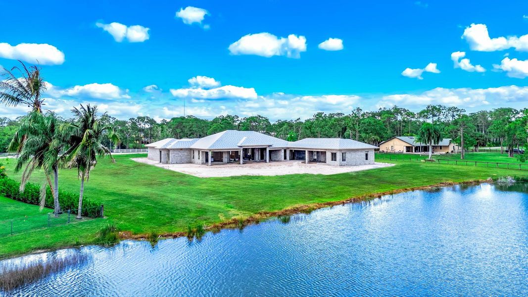Front exterior of a new home in , Lake Worth, FL, highlighting curb appeal (Image 7). Front exterior of a new home in , Lake Worth, FL, highlighting curb appeal (Image 7).