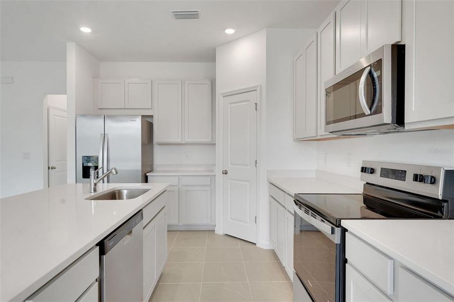 Furnished interior view inside a new home in Cypress Park Estates, Haines City (Image 8).