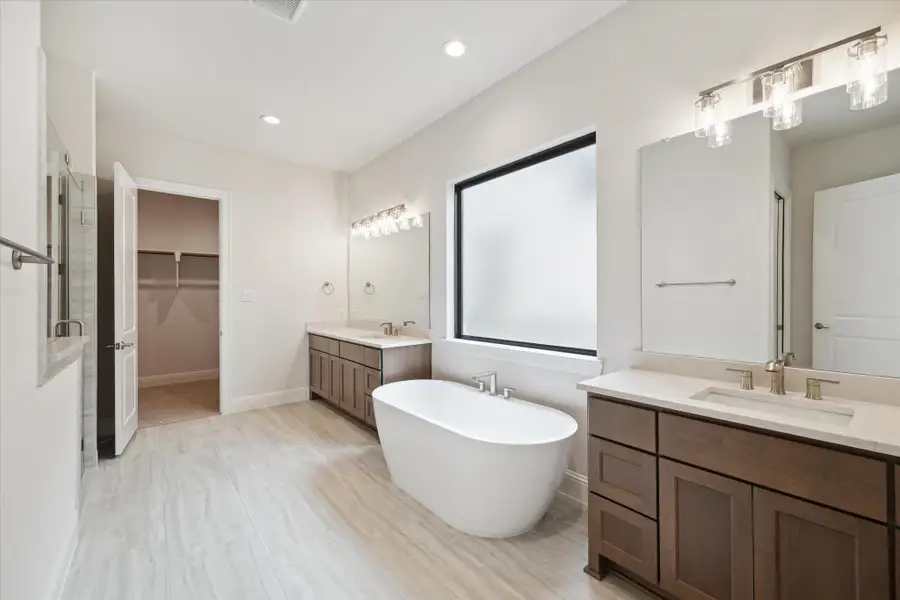 Separate Vanities and 2 Walk-in Closets. Separate Vanities and 2 Walk-in Closets.