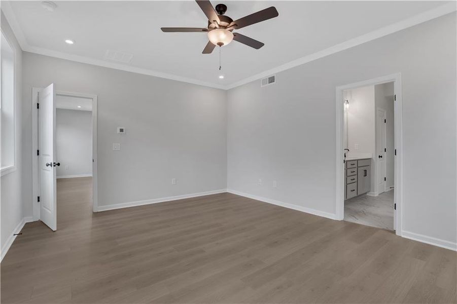 Spacious, unfurnished interior of a new home in The Paddocks at Doc Hughes, Buford (Image 43).