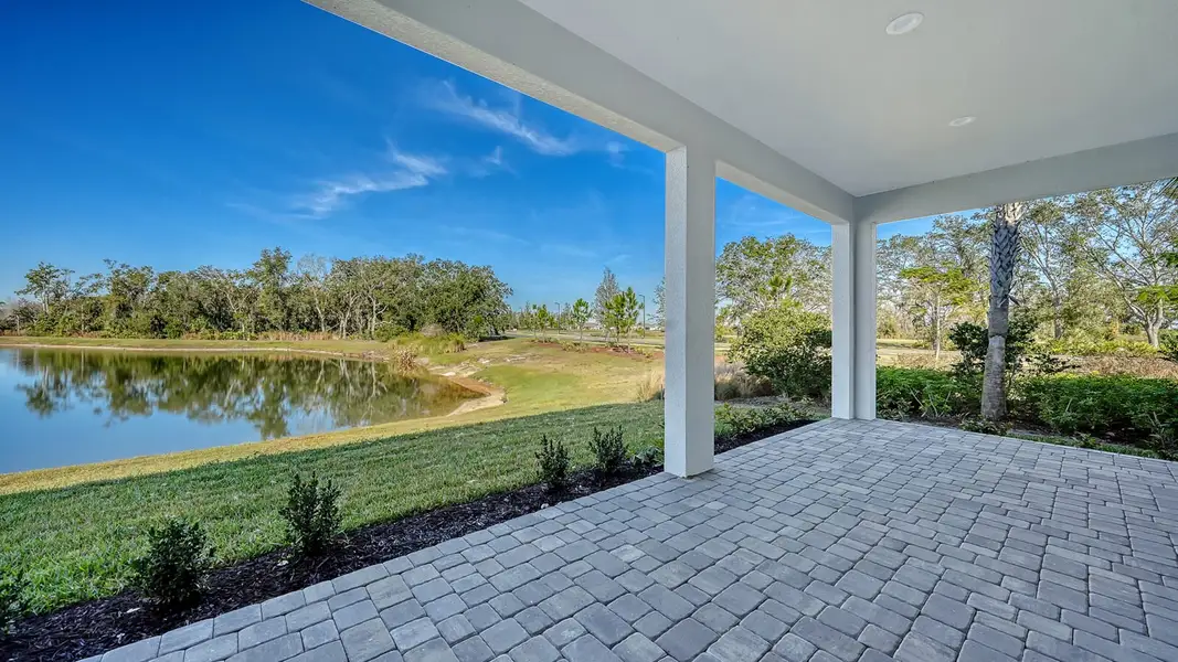 Exterior details and patio area of a home in Wildleaf, Parrish (Image 4).