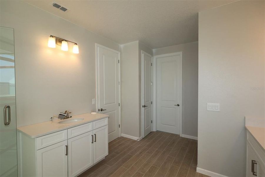 Furnished interior view inside a new home in Center Lake on the Park, St. Cloud (Image 4).