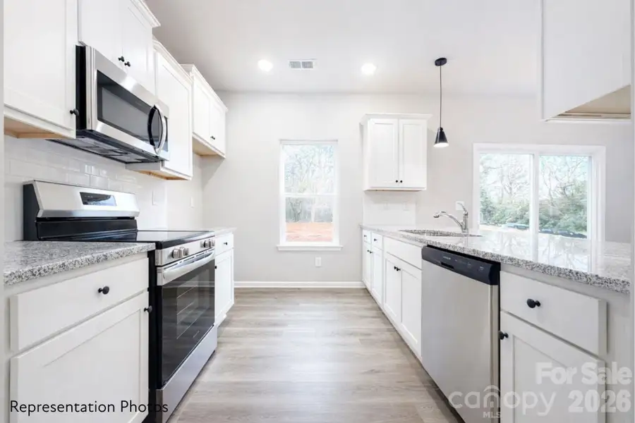 Furnished interior view inside a new home in , Charlotte (Image 3).