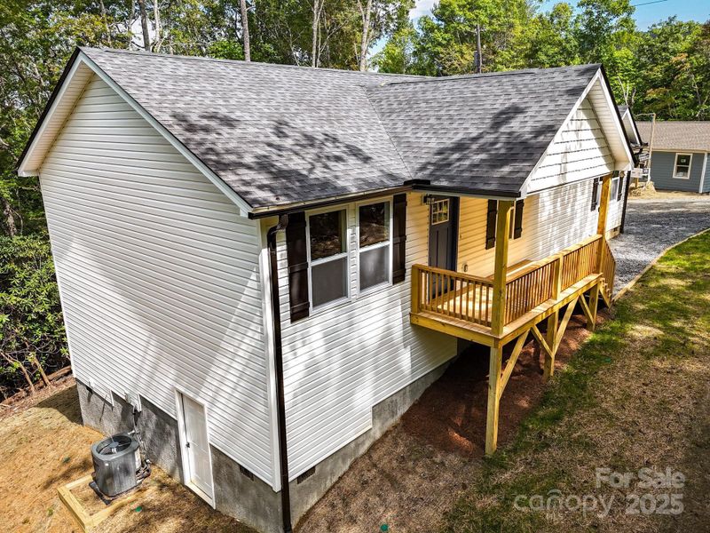 Front exterior of a new home in , Etowah, NC, highlighting curb appeal (Image 21). Front exterior of a new home in , Etowah, NC, highlighting curb appeal (Image 21).