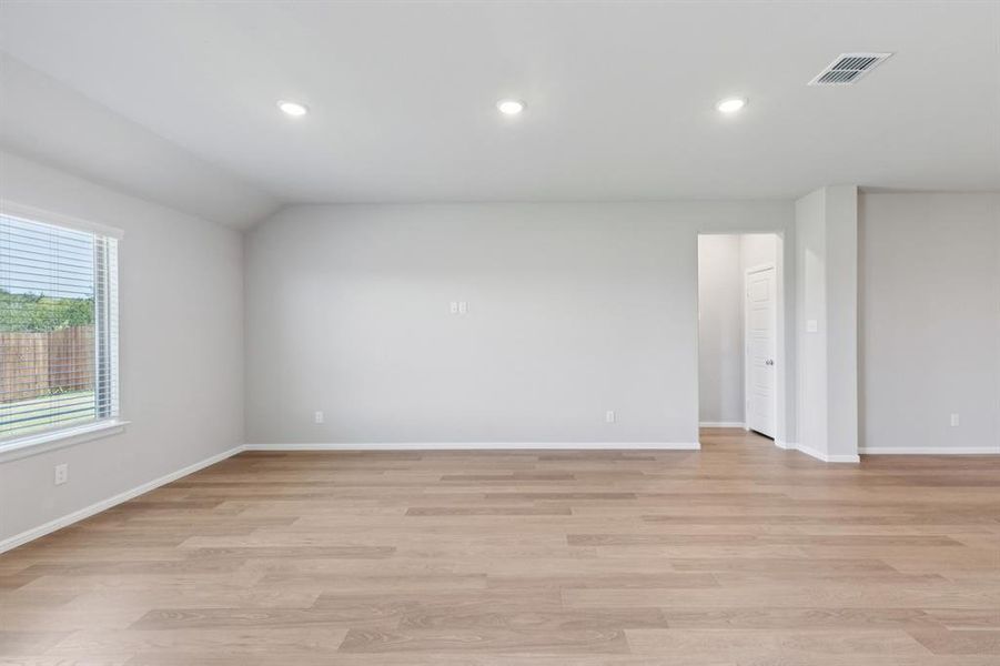 Living Room in the Harrison home plan by Trophy Signature Homes – REPRESENTATIVE PHOTO Living Room in the Harrison home plan by Trophy Signature Homes – REPRESENTATIVE PHOTO