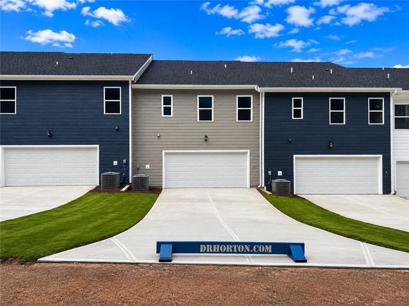 Front exterior of a new home in Brookland Commons, Monroe, GA, highlighting curb appeal (Image 17).