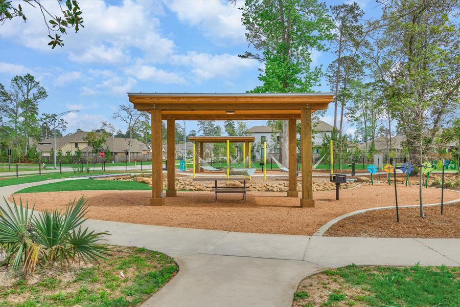 Picnic Park has shaded picnic tables, open green space, musical playground & hammocks.