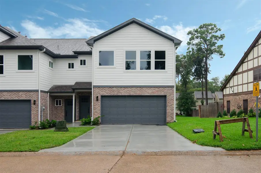 Front exterior of a new home in , Montgomery, TX, highlighting curb appeal (Image 1).