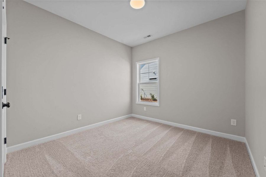 Representative unfurnished interior of a home built from the Weymouth by Caviness & Cates Communities in Bartlett Manor, Youngsville (Image 103).