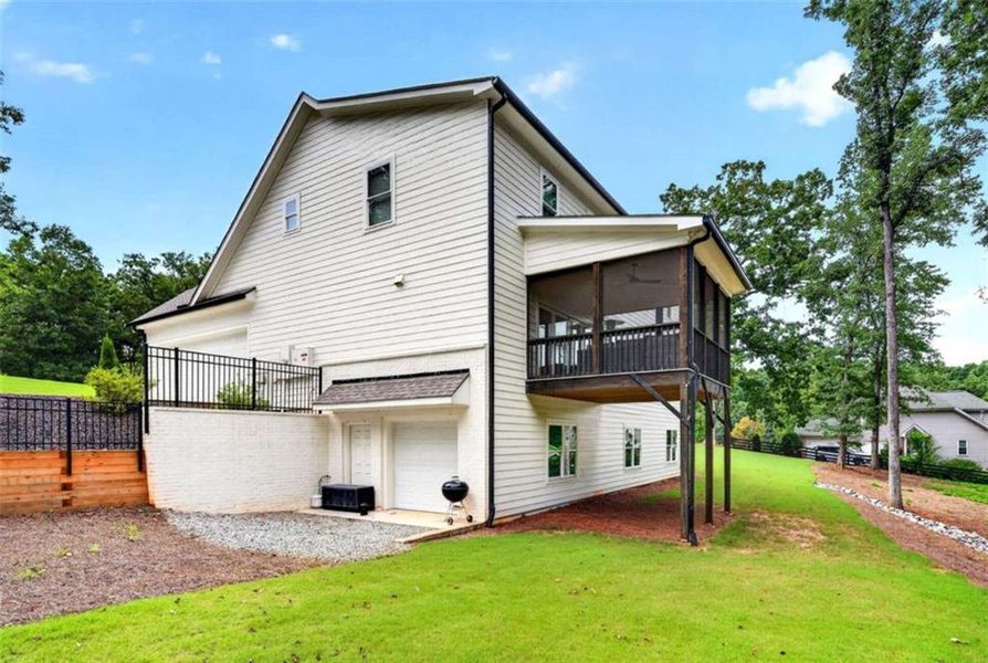 Exterior details and patio area of a home in , Hoschton (Image 36).