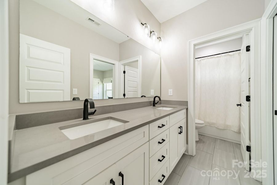 Furnished interior view inside a new home in , Waxhaw (Image 27).