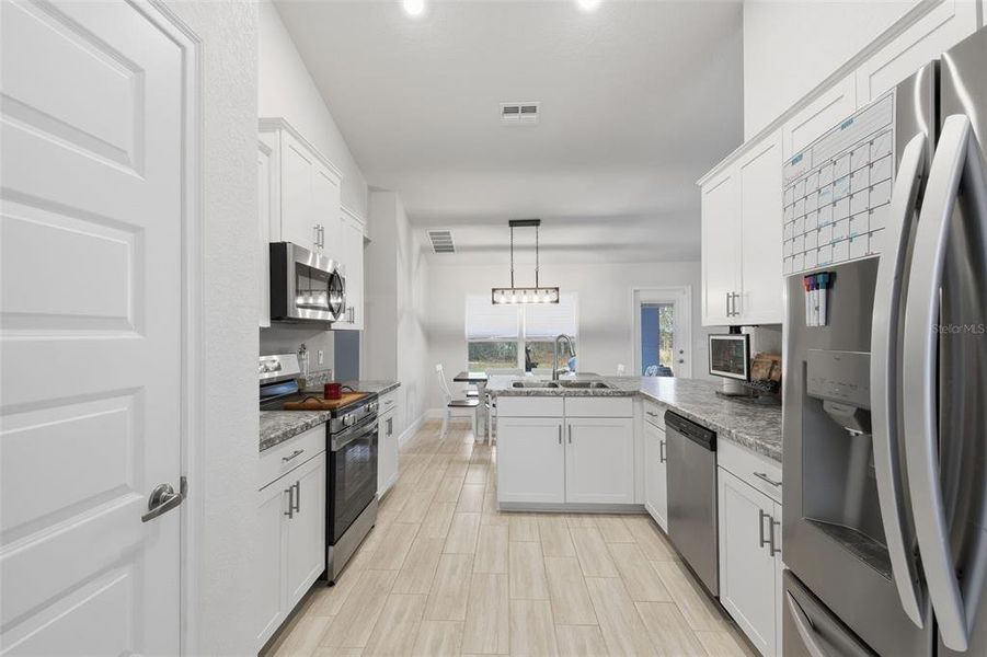 Furnished interior view inside a new home in Royal Highlands, Weeki Wachee (Image 8).