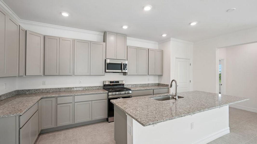 Furnished interior view inside a new home in Heritage Station, Punta Gorda (Image 6).