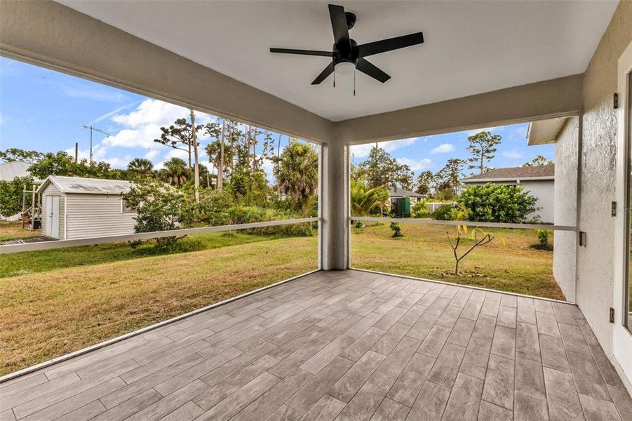 Exterior details and patio area of a home in , Port Charlotte (Image 24).