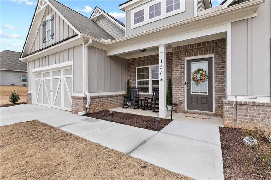 Exterior details and patio area of a home in Laurel Cove, Hoschton (Image 25).