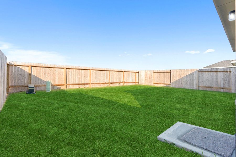 Spacious backyard with a fully fenced lawn offering plenty of room for outdoor fun, gardening, or relaxing weekends under the Texas sun. A perfect setting for gatherings or a future patio setup! Spacious backyard with a fully fenced lawn offering plenty of room for outdoor fun, gardening, or relaxing weekends under the Texas sun. A perfect setting for gatherings or a future patio setup!