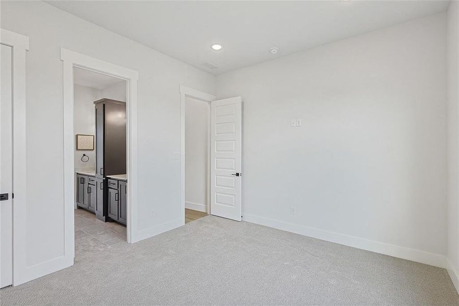 Bedroom #3 with walk in closet and access to jack and jill bathroom