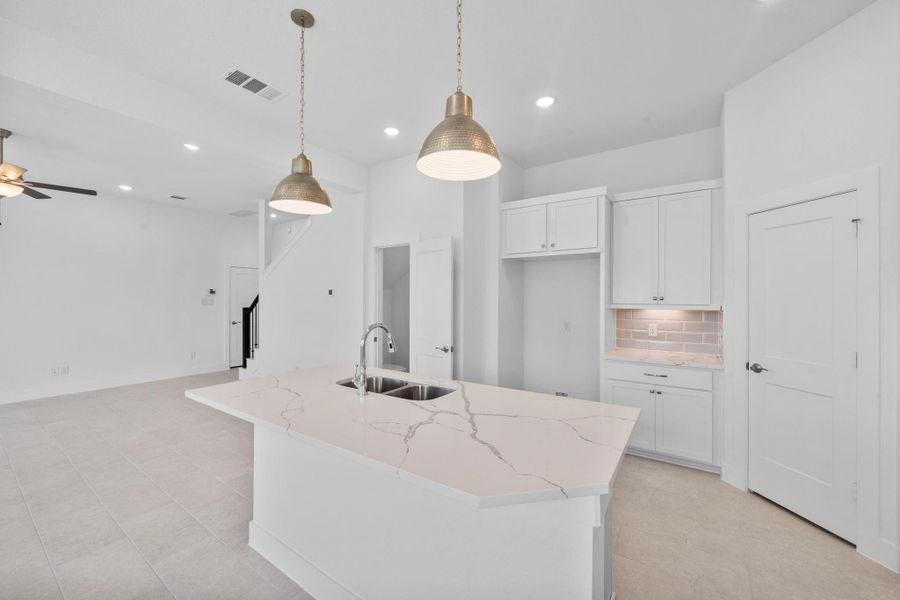 Furnished interior view inside a new home in Bridgeland, Cypress (Image 7).