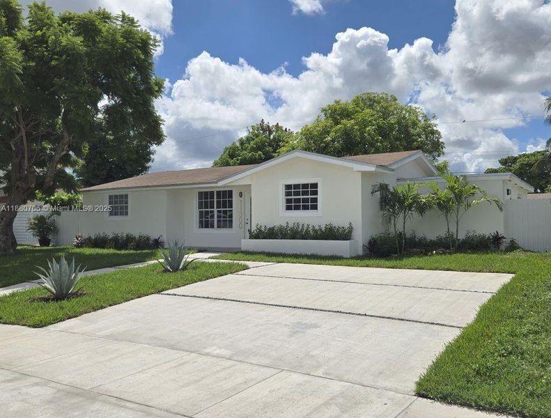 Front exterior of a new home in , Miami, FL, highlighting curb appeal (Image 2). Front exterior of a new home in , Miami, FL, highlighting curb appeal (Image 2).
