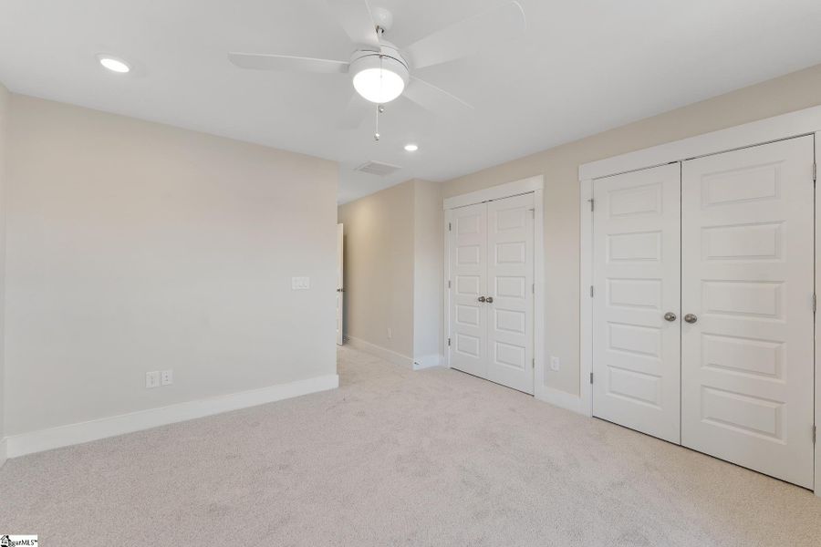 Spacious, unfurnished interior of a new home in Renaissance Place, Greenville (Image 19).