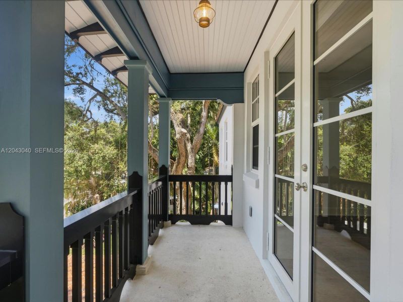 Exterior details and patio area of a home in , South Miami (Image 27).