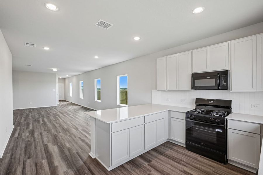Furnished interior view inside a new home in Cloverleaf, Austin (Image 9).