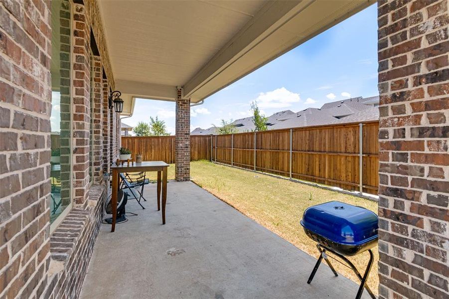 Exterior details and patio area of a home in Bayside, Rowlett (Image 4). Exterior details and patio area of a home in Bayside, Rowlett (Image 4).