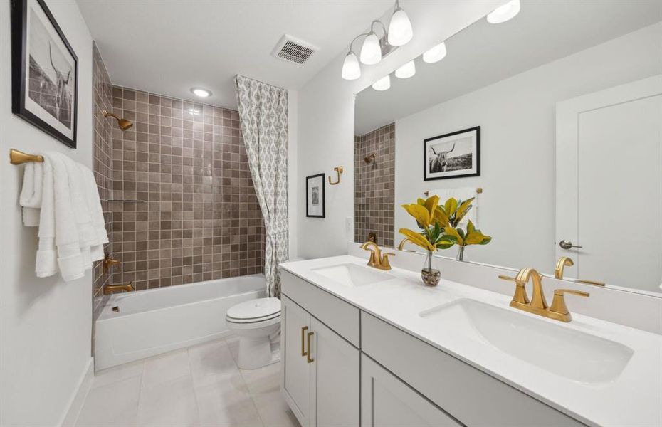 Secondary bathroom *photos may depict options and features that aren't available Secondary bathroom *photos may depict options and features that aren't available