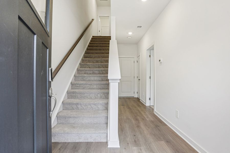 Spacious, unfurnished interior of a new home in Greystone - Highland Townhomes, Smyrna (Image 8).