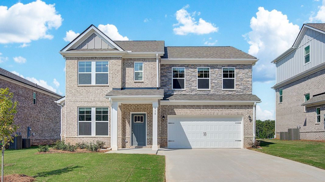 Representative exterior photo of a completed home built from the Ridgewood by DRB Homes in Bowers Farm, McDonough, GA (Image 23).