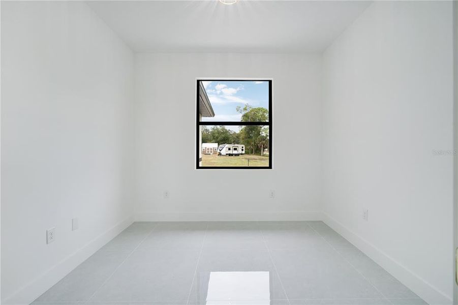 Spacious, unfurnished interior of a new home in , Port Charlotte (Image 24).