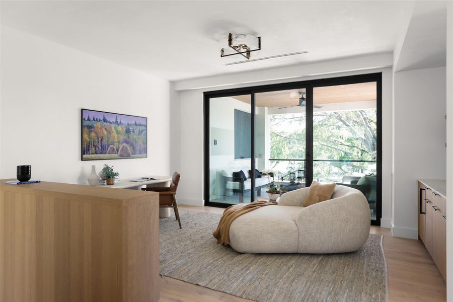 Living area with light wood-style flooring
