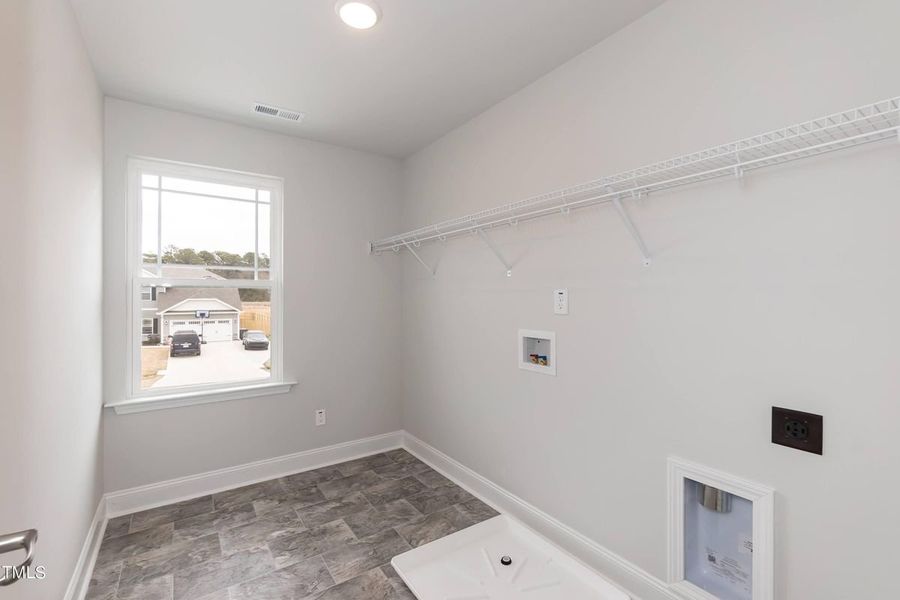 Representative unfurnished interior of a home built from the 2913 by Adams Homes in Hidden Pines, Cameron (Image 34).