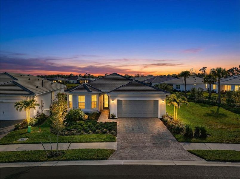 Front exterior of a new home in , Englewood, FL, highlighting curb appeal (Image 22). Front exterior of a new home in , Englewood, FL, highlighting curb appeal (Image 22).
