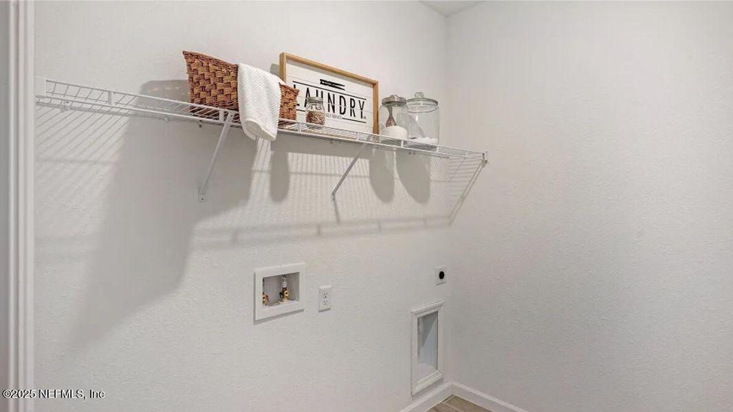 Furnished interior view inside a new home in Edenbrooke at Hyland Trail | 55+: Edenbrooke at Hyland Trail 50s, Green Cove Springs (Image 17).