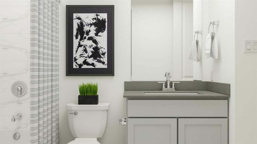 Bathroom with vanity and toilet