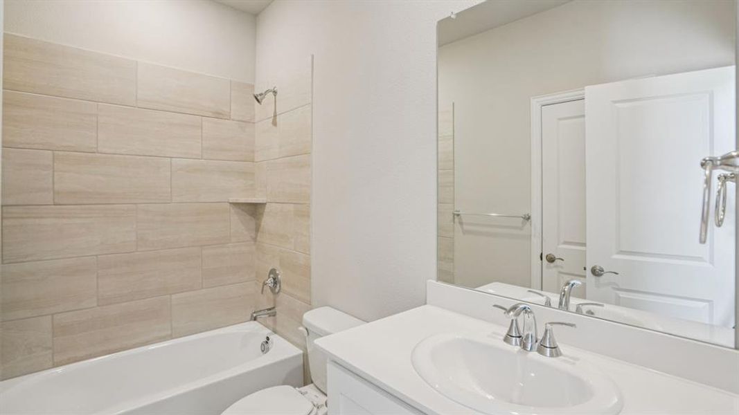 Photo is not of the actual home, but is an inspirational photo of builder’s model home and may depict options, furnishings, and/or decorator features that are not included.