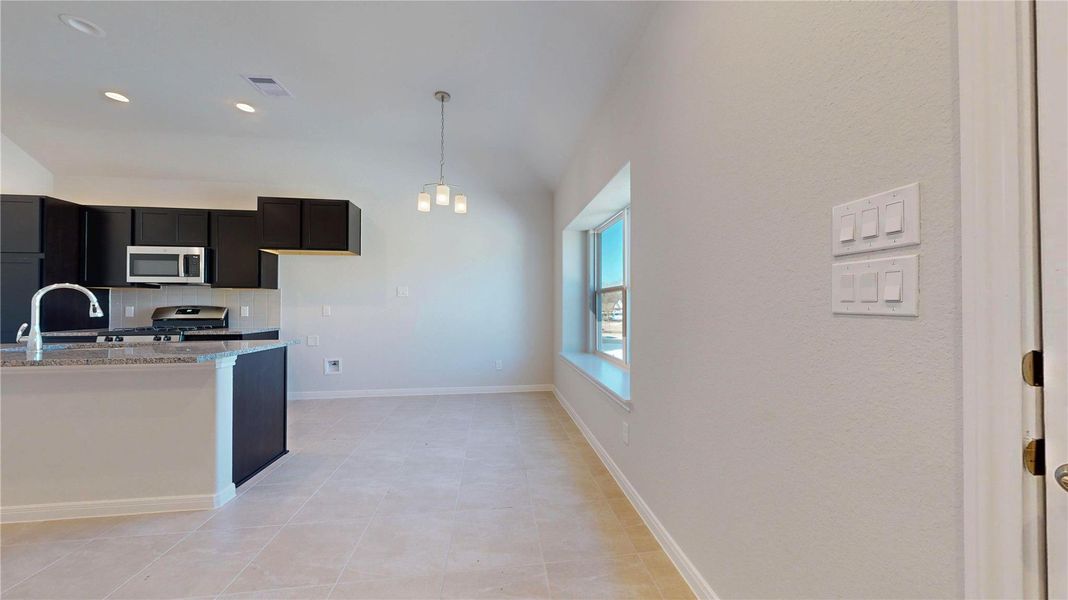 Furnished interior view inside a new home in East Gate Villas, Willis (Image 7).