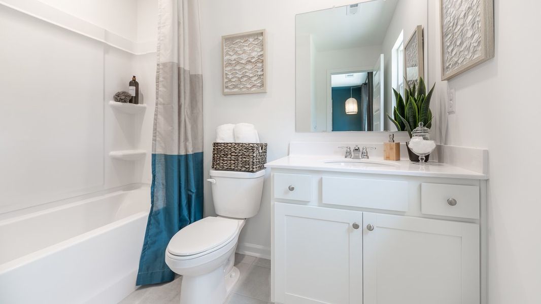 Representative furnished interior of a home built from the Knollwood by D.R. Horton in Benteen Reserve, Atlanta (Image 23).