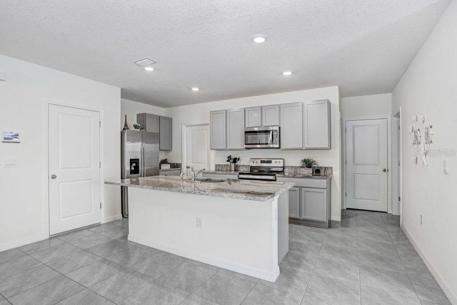 Furnished interior view inside a new home in Epperson, Wesley Chapel (Image 9).