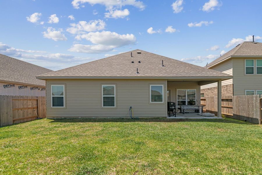 Front exterior of a new home in Sunterra, Katy, TX, highlighting curb appeal (Image 20). Front exterior of a new home in Sunterra, Katy, TX, highlighting curb appeal (Image 20).