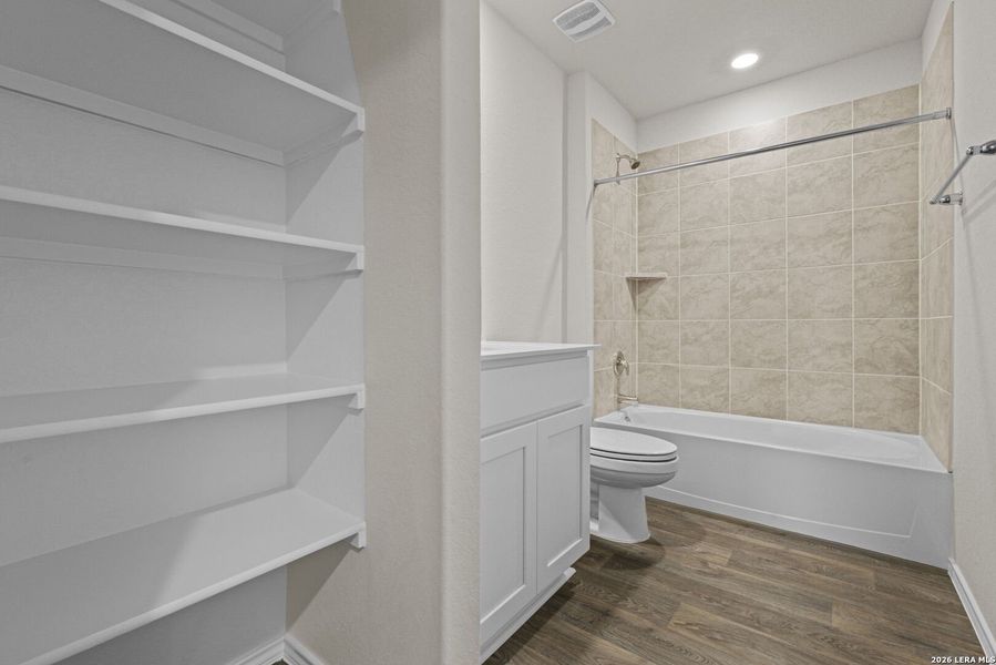 Furnished interior view inside a new home in Redbird Ranch, San Antonio (Image 9).