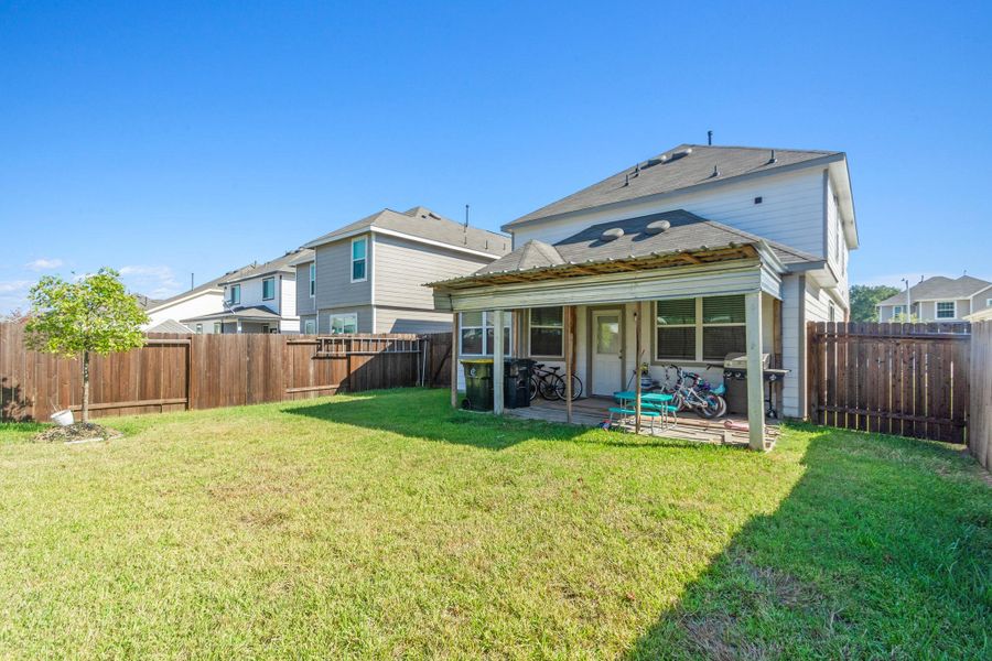 Exterior details and patio area of a home in , Conroe (Image 2). Exterior details and patio area of a home in , Conroe (Image 2).