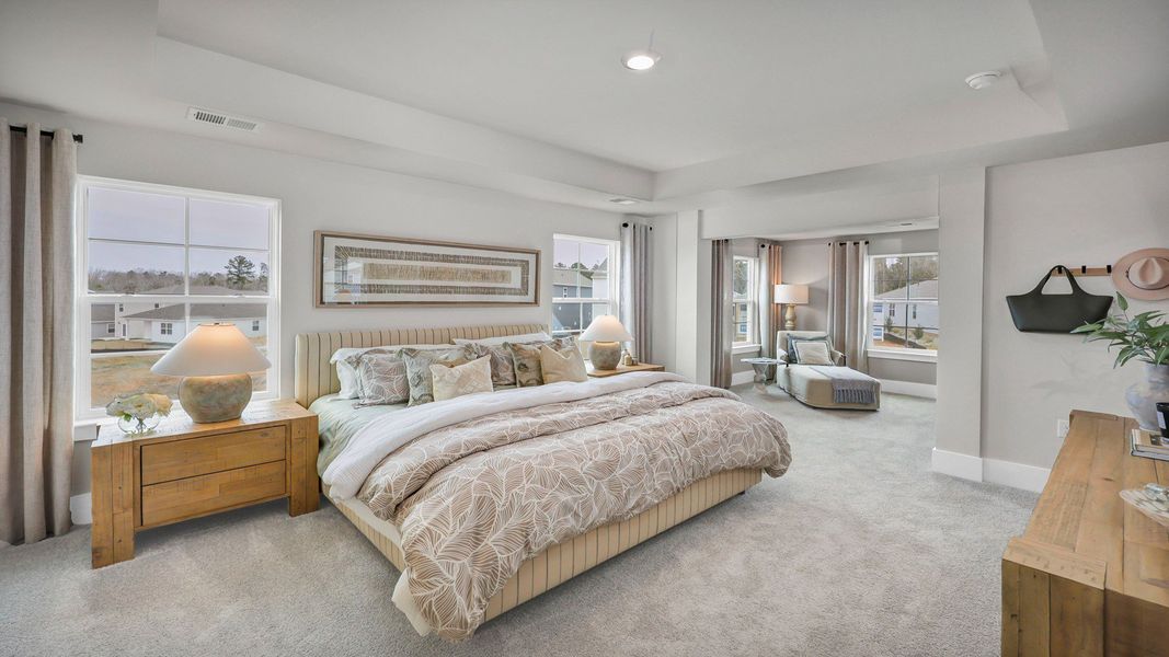 Representative furnished interior of a home built from the Harbor Oak by D.R. Horton in Lake Tide Summit, Chapin (Image 36).