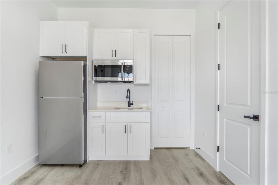 Furnished interior view inside a new home in , Ocala (Image 6).
