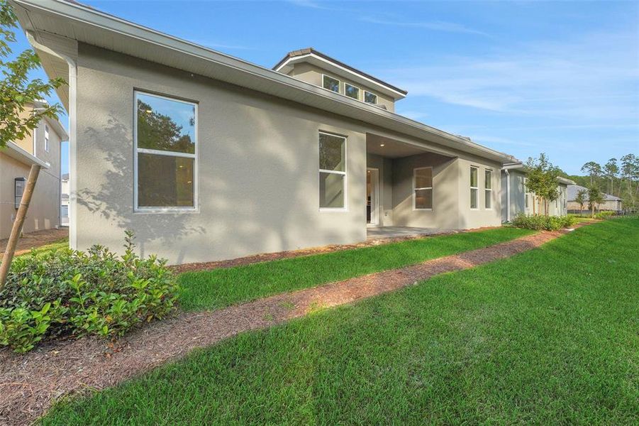 Exterior details and patio area of a home in Palms at Windermere, Windermere (Image 25). Exterior details and patio area of a home in Palms at Windermere, Windermere (Image 25).