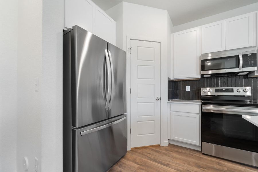 Furnished interior view inside a new home in Conestoga, Ault (Image 8).